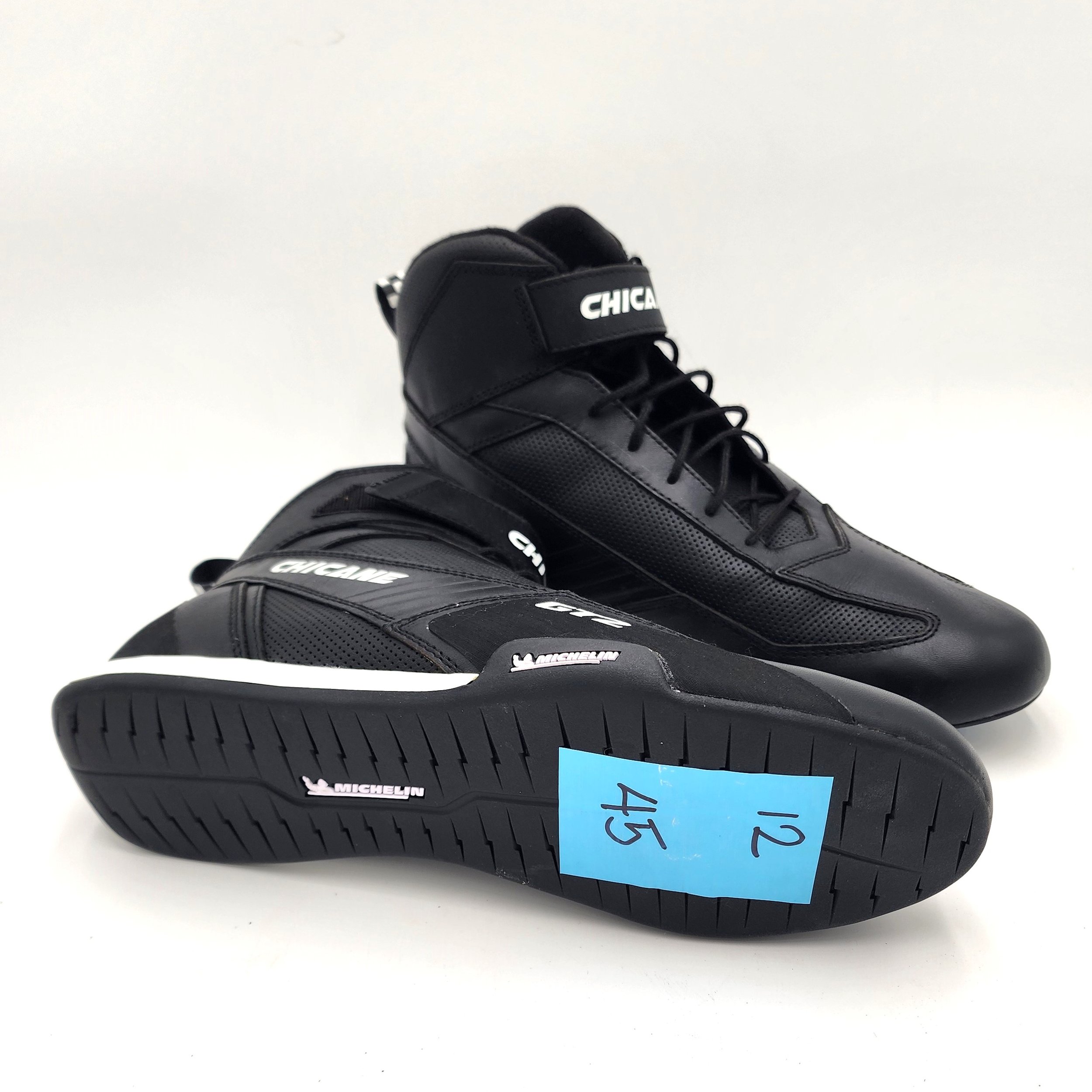This Chicane GT2 black leather, size 13 racing shoe has been used